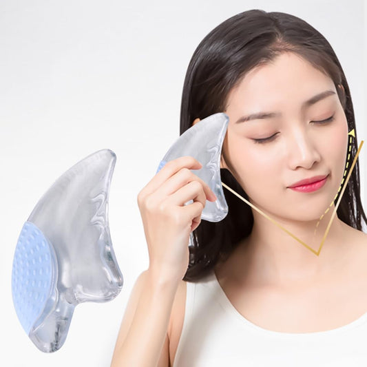 Natural Gua Sha Massage Tool being used by a woman for facial massage and relaxation.